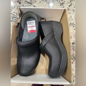 Dansko black leather clogs